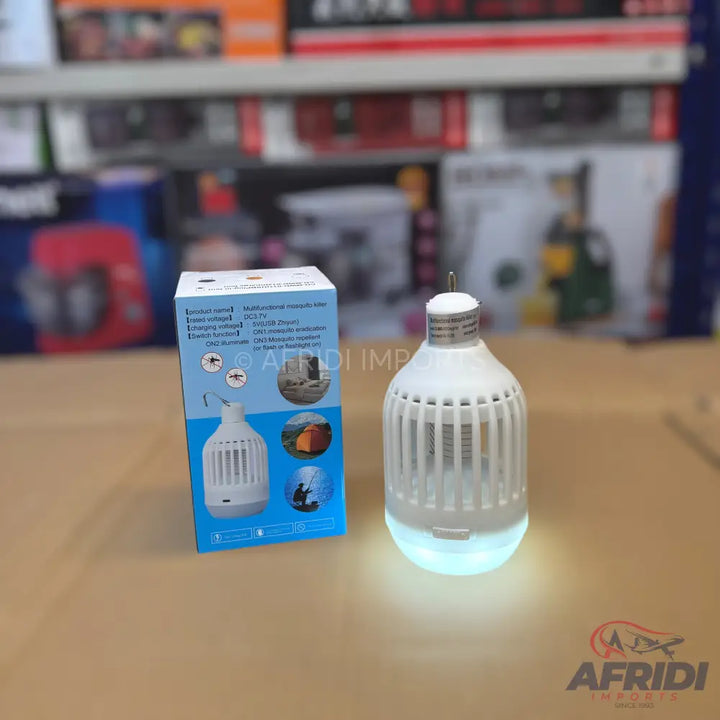 A white, electric mosquito killer lamp with a blue light.