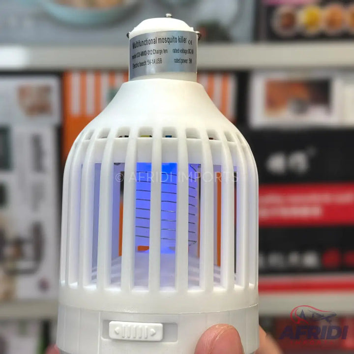 White plastic mosquito killer lamp with a blue UV light.