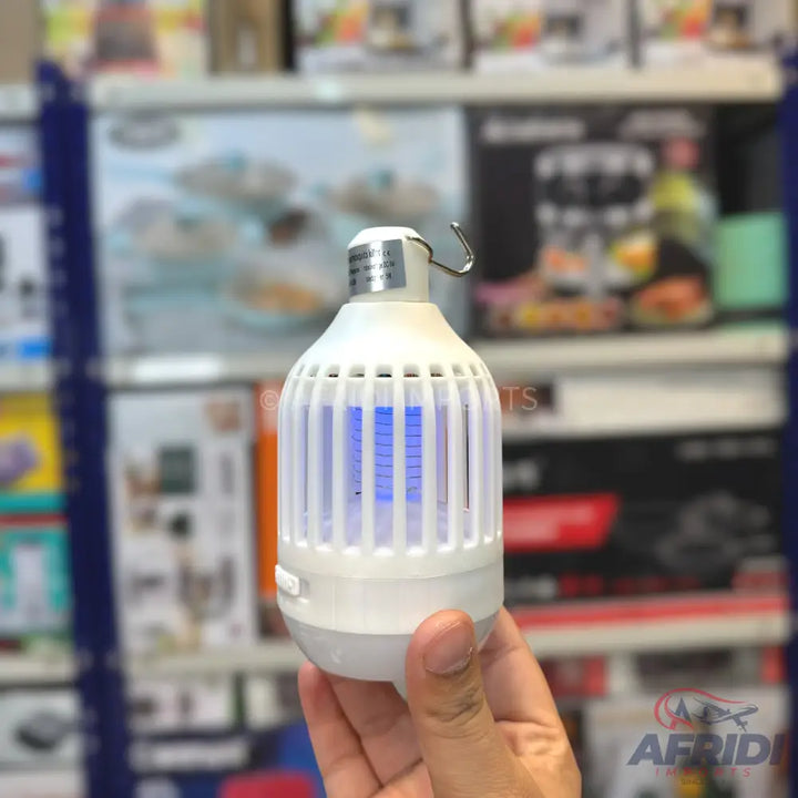 A white, caged insect killer light bulb with a hook for hanging.