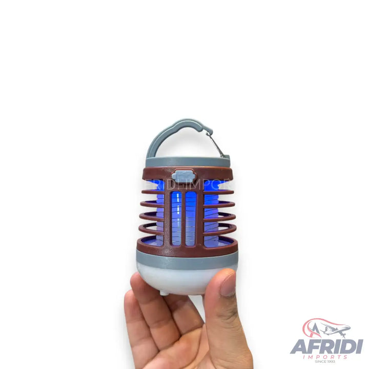 Portable electric mosquito killer with a blue UV light and a carrying handle.