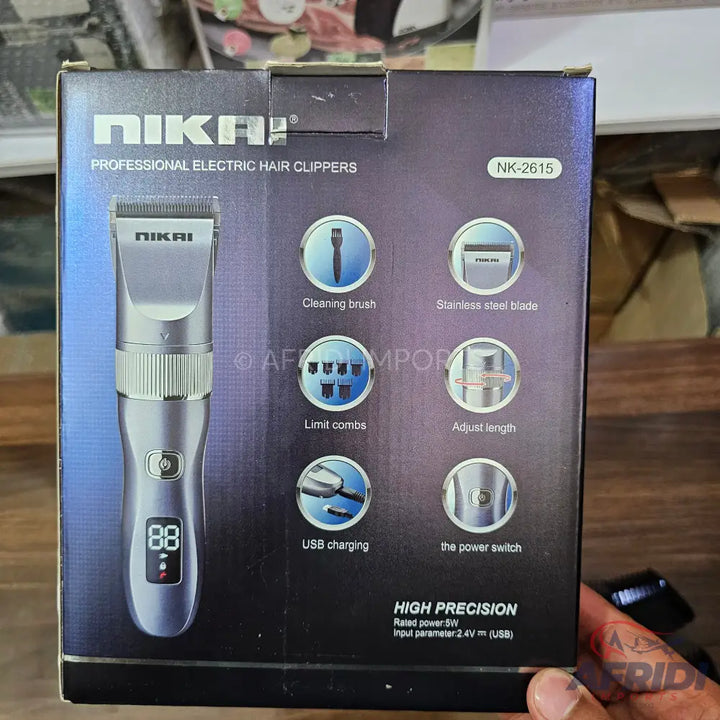 A boxed professional electric hair clipper with a digital display, cleaning brush, limit combs, adjustable length, USB charging, and a stainless steel blade.