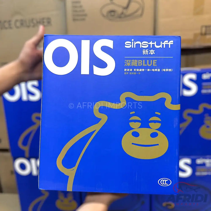 Blue box with a gold cow design.