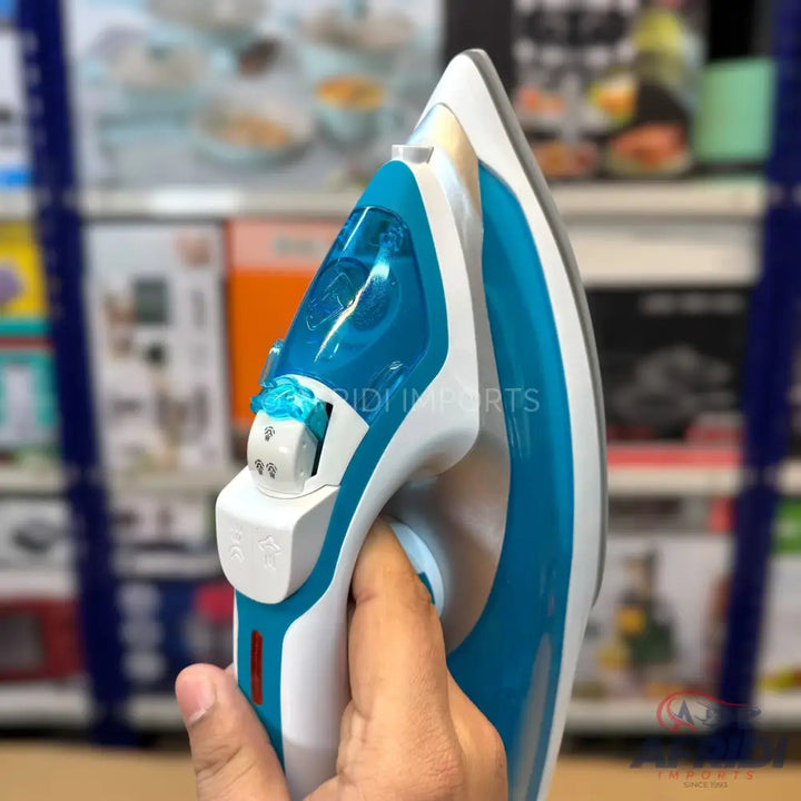 A white and blue steam iron with a visible water reservoir.