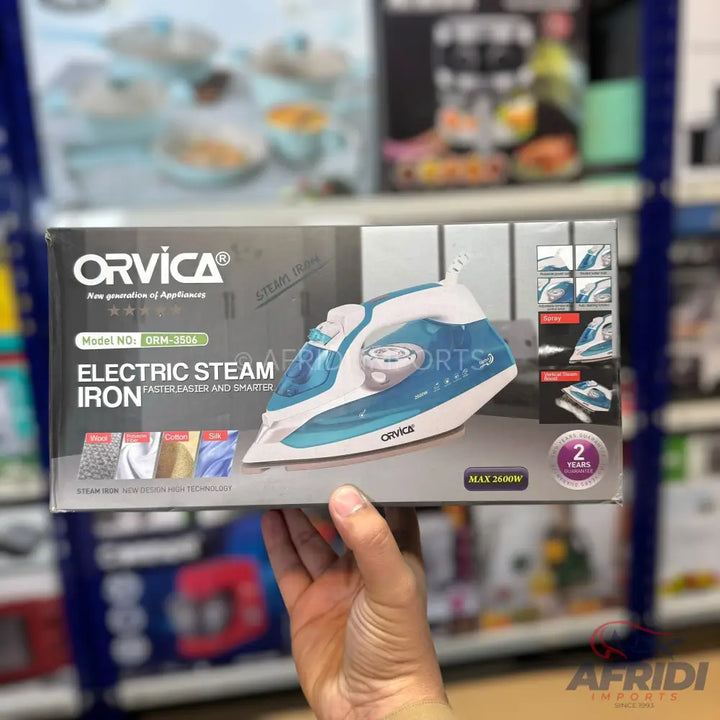 A boxed electric steam iron with a blue and white design, offering multiple fabric settings and a 2-year warranty.