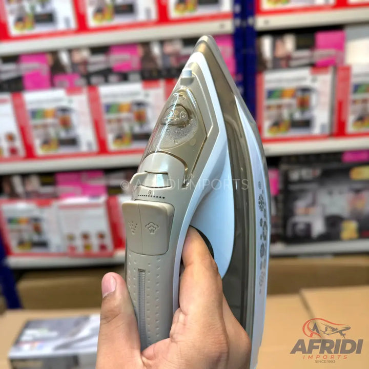 A light gray and blue steam iron with a clear water tank and an adjustable steam dial.