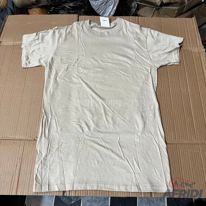 Solid light-colored short-sleeved t-shirt.
