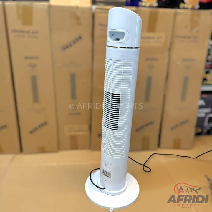 White tower fan with a remote control slot at the top.