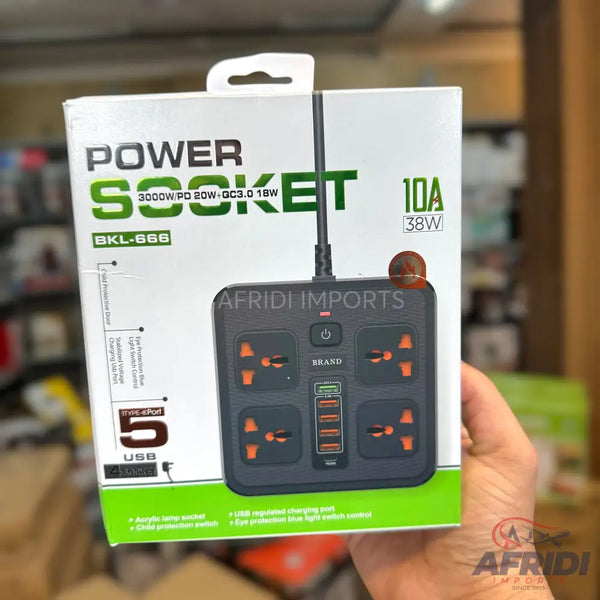 Black power strip with four universal outlets and five USB ports.