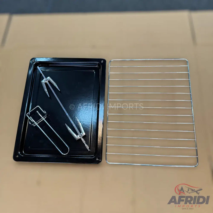Oven accessories including a black baking pan, a chrome wire rack, and rotisserie components.