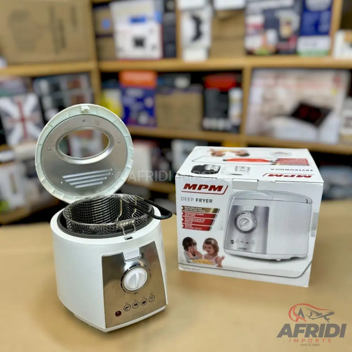 White and silver deep fryer with an open lid, a removable frying basket, and a control dial.