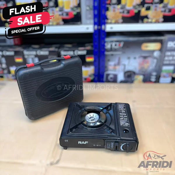 Portable black gas stove with its carrying case.