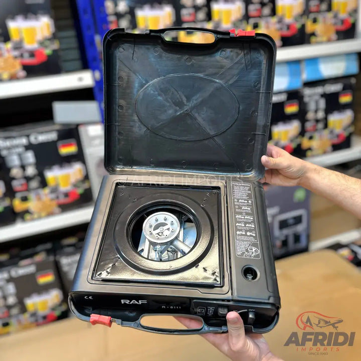 Portable single-burner gas stove for outdoor cooking.