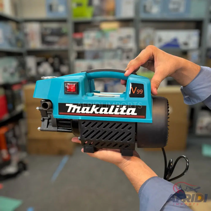Light blue and black portable electric pressure washer with a carrying handle.