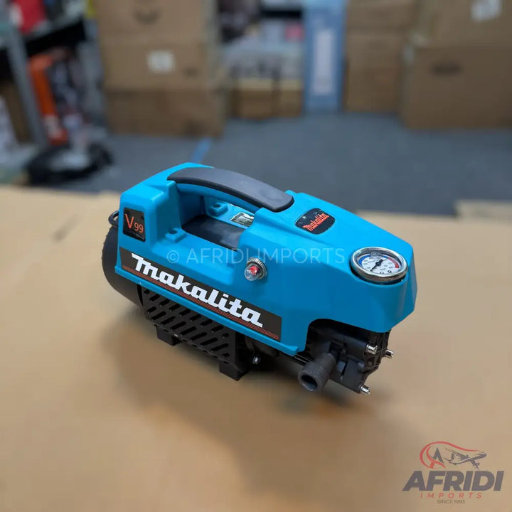 A light blue and black portable pressure washer with a top handle and a pressure gauge.