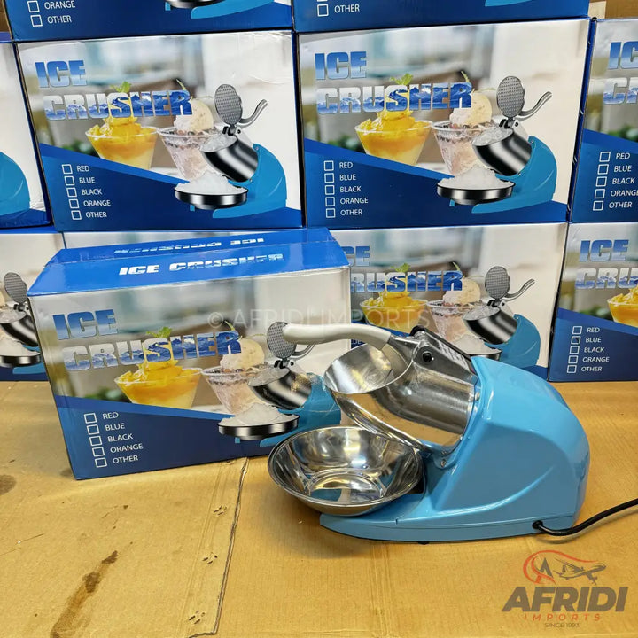 A light blue electric ice crusher with a stainless steel bowl and crushing mechanism.