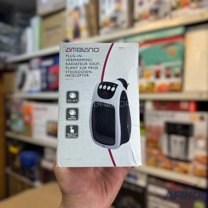 A boxed plug-in heater with temperature control and a timer function.