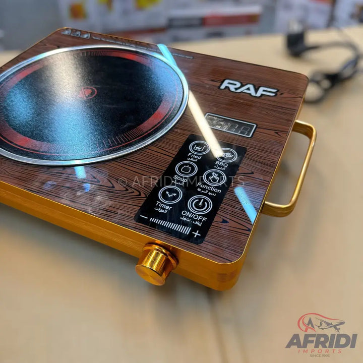 A portable electric induction cooktop with a wood-grain finish, digital display, and touch controls.