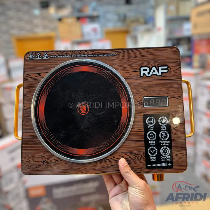 A portable induction cooktop with a wood grain finish, digital display, and touch controls for various cooking functions.