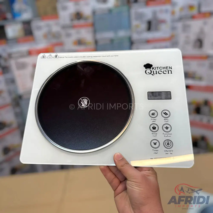 White portable induction cooktop with a single burner and touch controls.