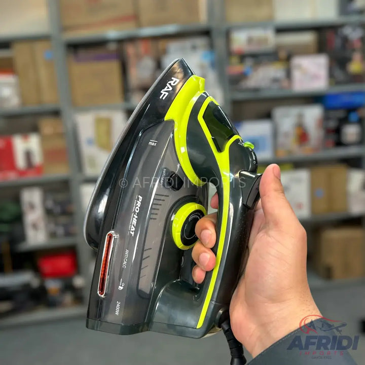 A black and neon green steam iron with a visible water tank.