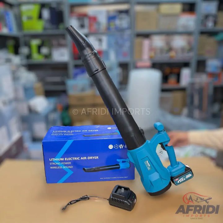 A cordless teal and black electric air blower with a battery and charger.