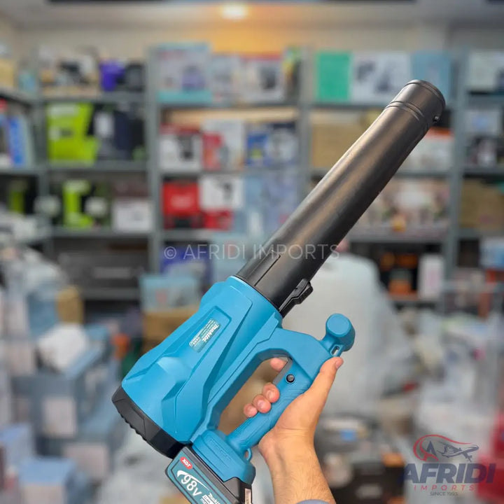A cordless electric leaf blower in teal and black.