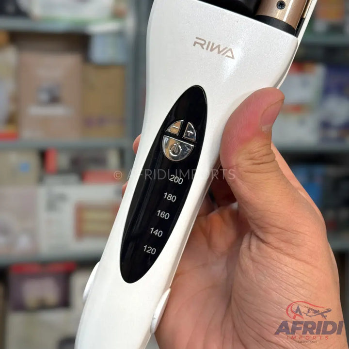 White hair curler with temperature settings from 120 to 200 degrees.