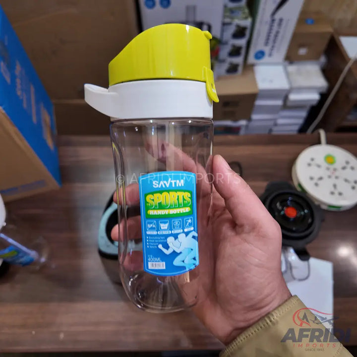 Clear plastic sports water bottle with a yellow flip-top lid.