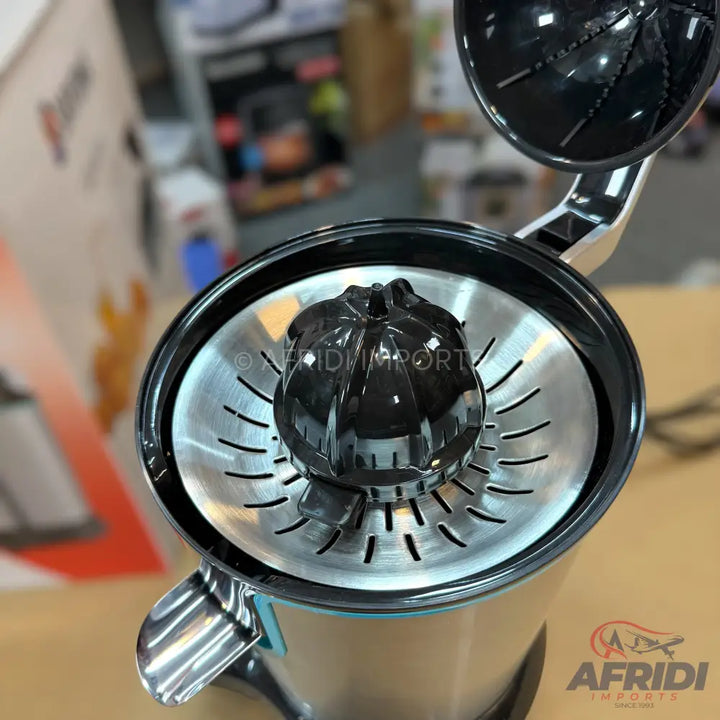 A stainless steel citrus juicer with a black reamer and a hinged top.