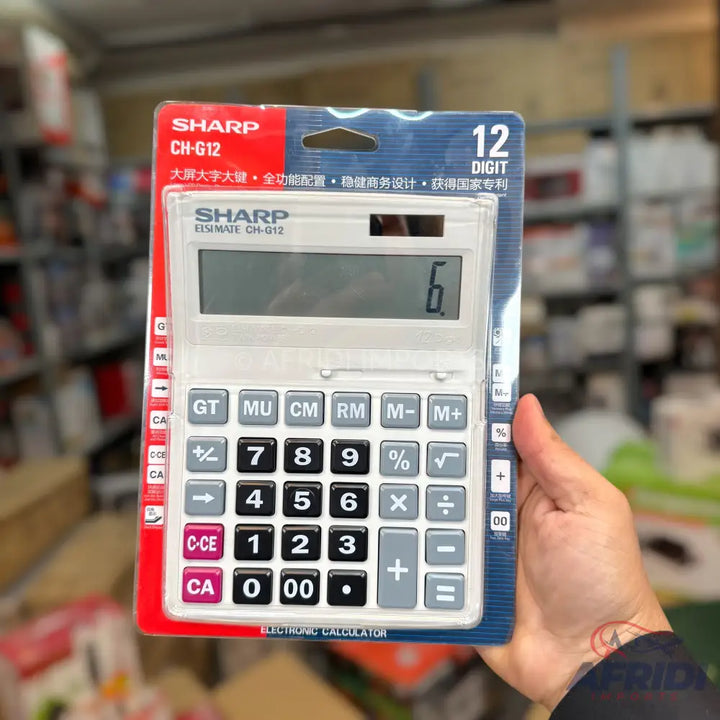A white, 12-digit electronic calculator with black and colored buttons, packaged in a red and blue blister pack.