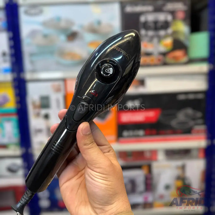 A black handheld automatic hair curler.