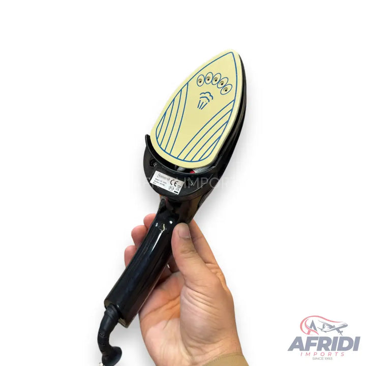 A black handheld steam iron with a cream-colored soleplate featuring steam holes and blue stripes.