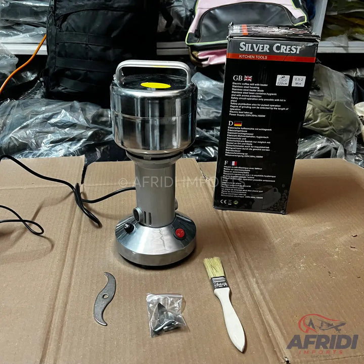 Silver Crest electric coffee and spice grinder with stainless steel housing.