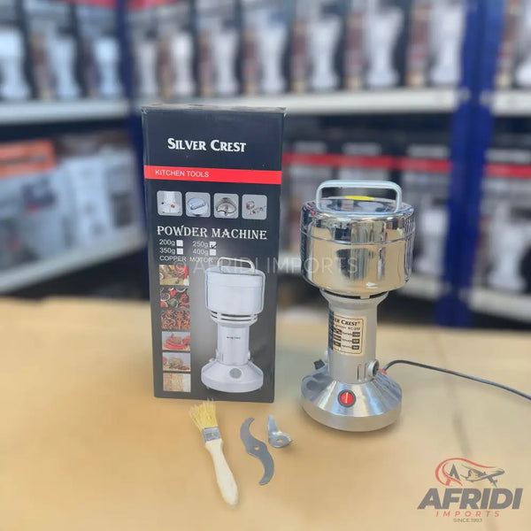 A ’Silver Crest’ brand ’Powder Machine’ for kitchen use, capable of grinding various ingredients into powder.
