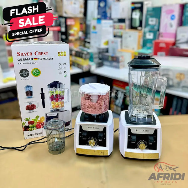 A white and gold Silver Crest blender with multiple attachments for various blending and grinding tasks.