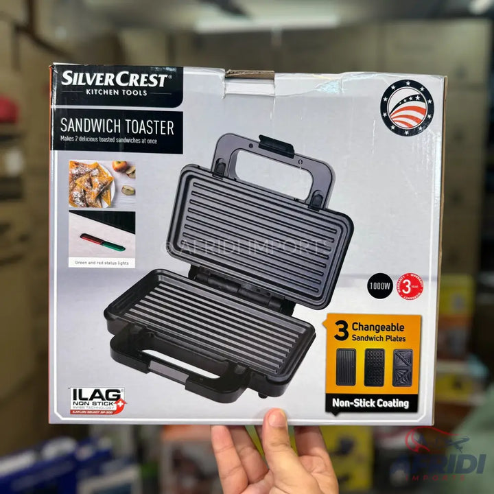 A SilverCrest sandwich toaster with 3 changeable non-stick plates and 1000W power.