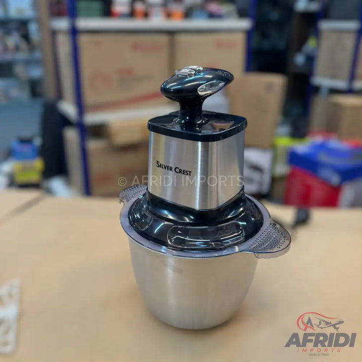 Silver Crest electric food chopper with a stainless steel bowl.