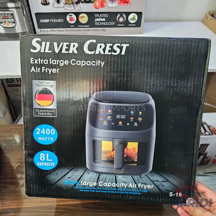 Silver Crest extra-large capacity air fryer with German technology, 2400 watts, and 8L capacity.