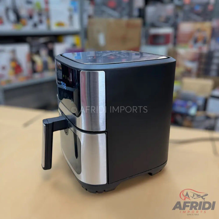 Black and silver digital air fryer with a pull-out basket.
