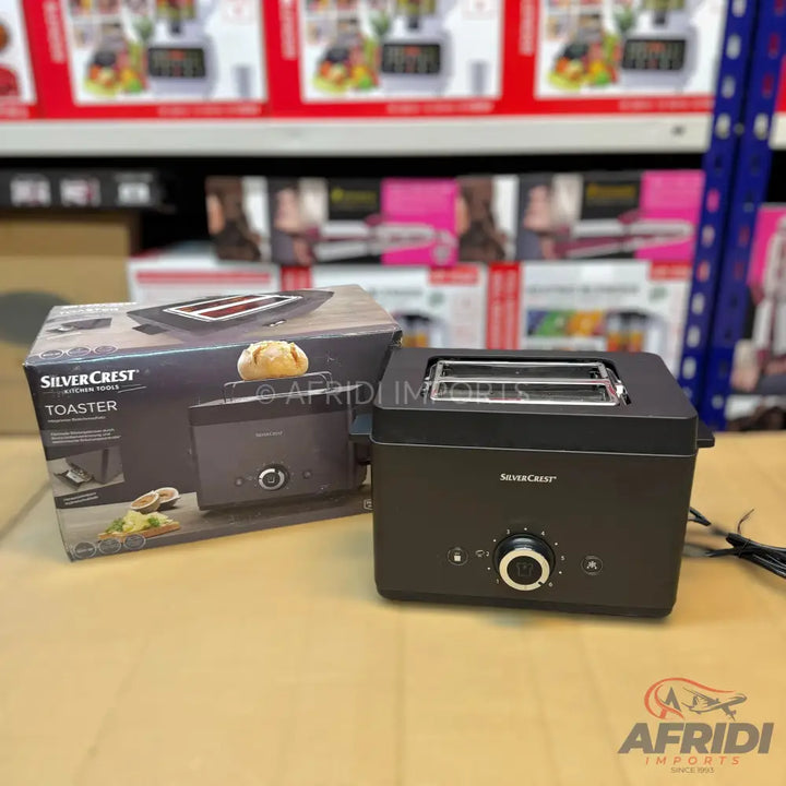 Black two-slice toaster with a removable bun warmer.