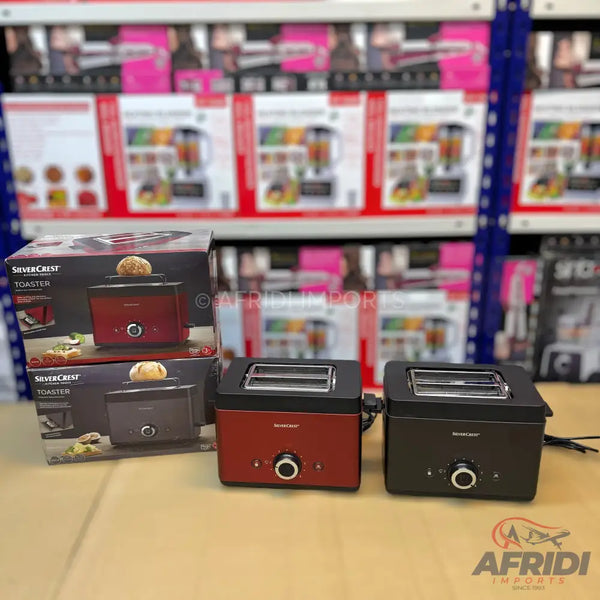 Two SilverCrest toasters in red and black, with a single slot and a round control knob.