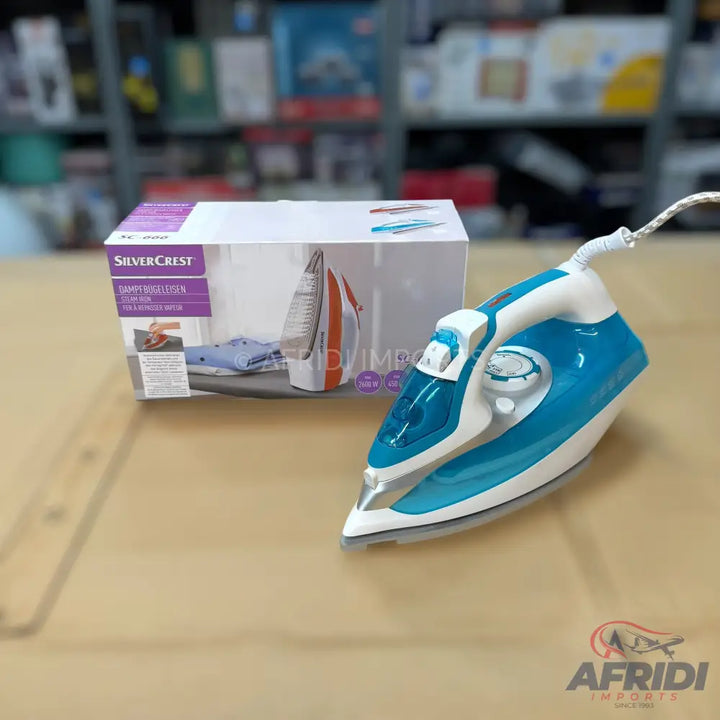A blue and white steam iron with a white power cord.