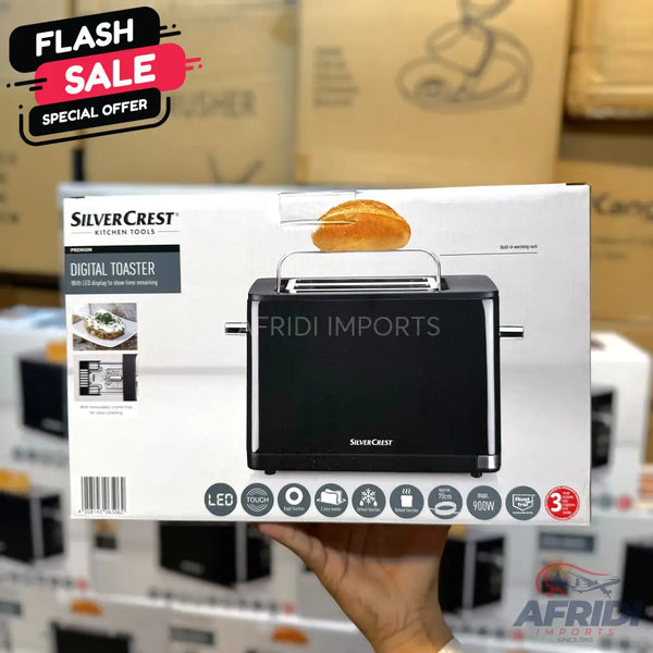 A black SilverCrest digital toaster with a bun warmer rack, featuring LED and touch controls, 900W power, and a 3-year warranty.