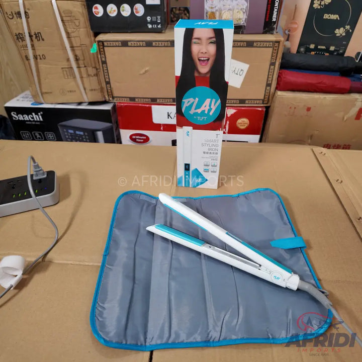 Hair straightener with a heat-resistant mat.