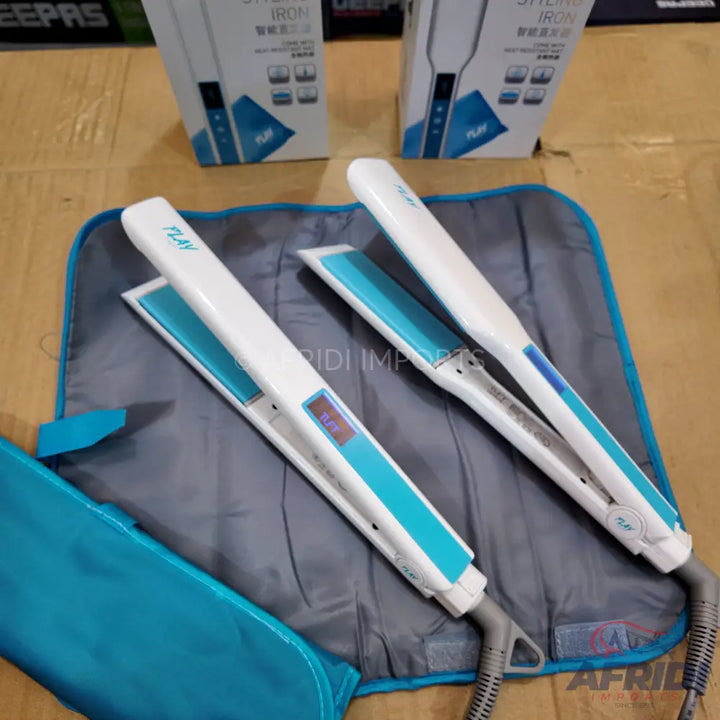 Two white and blue flat irons with digital temperature displays.