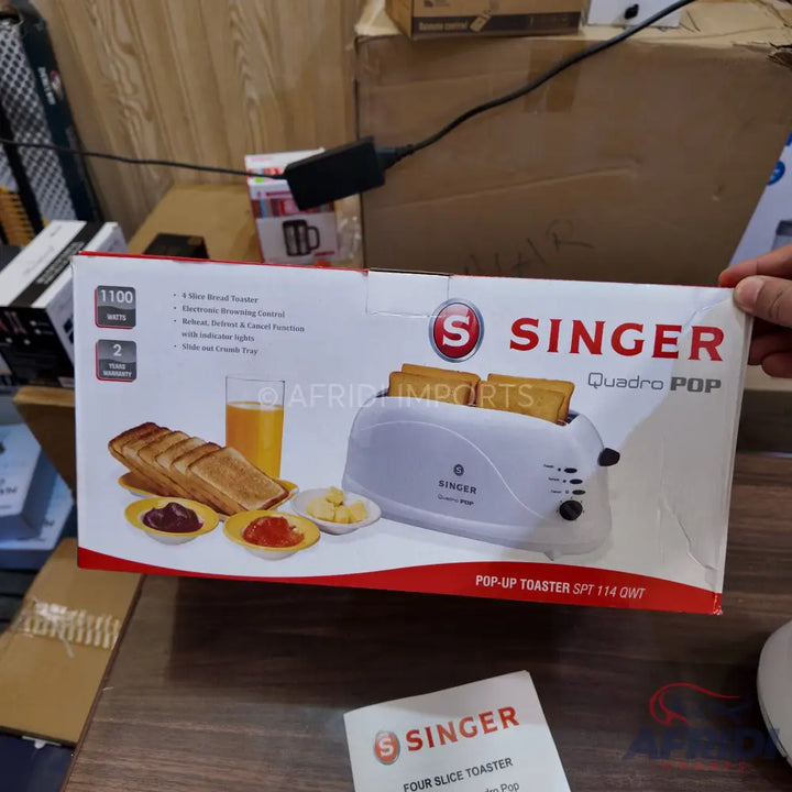White Singer Quadro POP four-slice pop-up toaster with 1100 watts of power and a 2-year warranty.