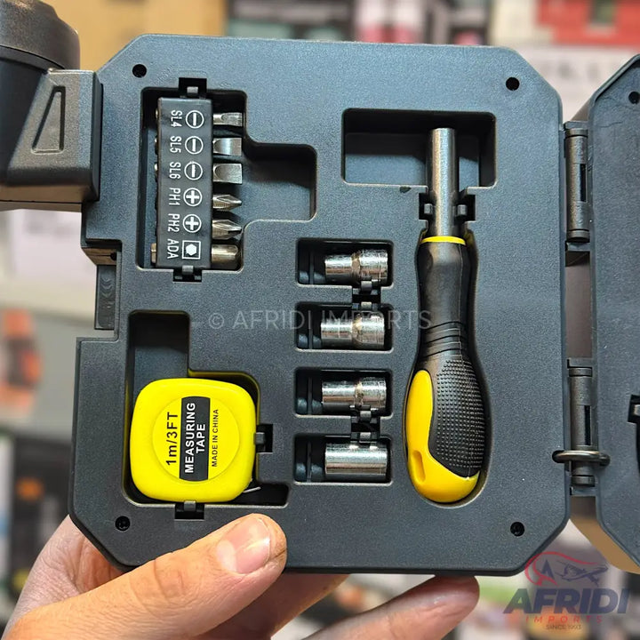 A compact multi-tool kit with interchangeable screwdriver bits, a handle, sockets, and a measuring tape.