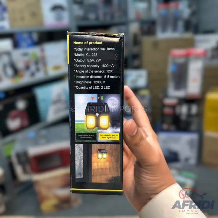 A solar-powered wall lamp with a motion sensor, two LEDs, 1800mAh battery, and 1200 lumens brightness.