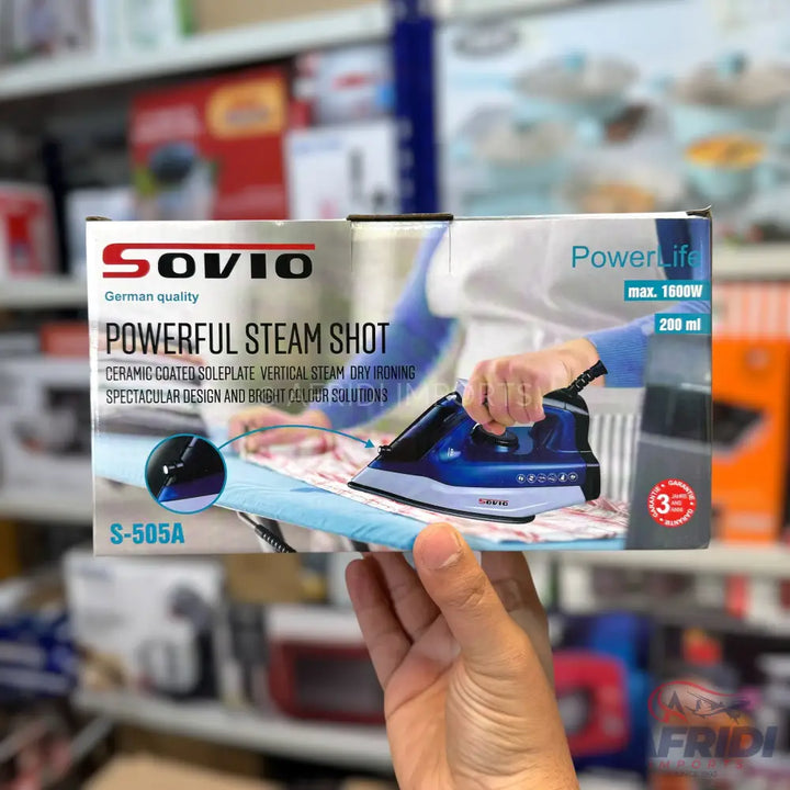 Boxed electric steam iron with ceramic soleplate.