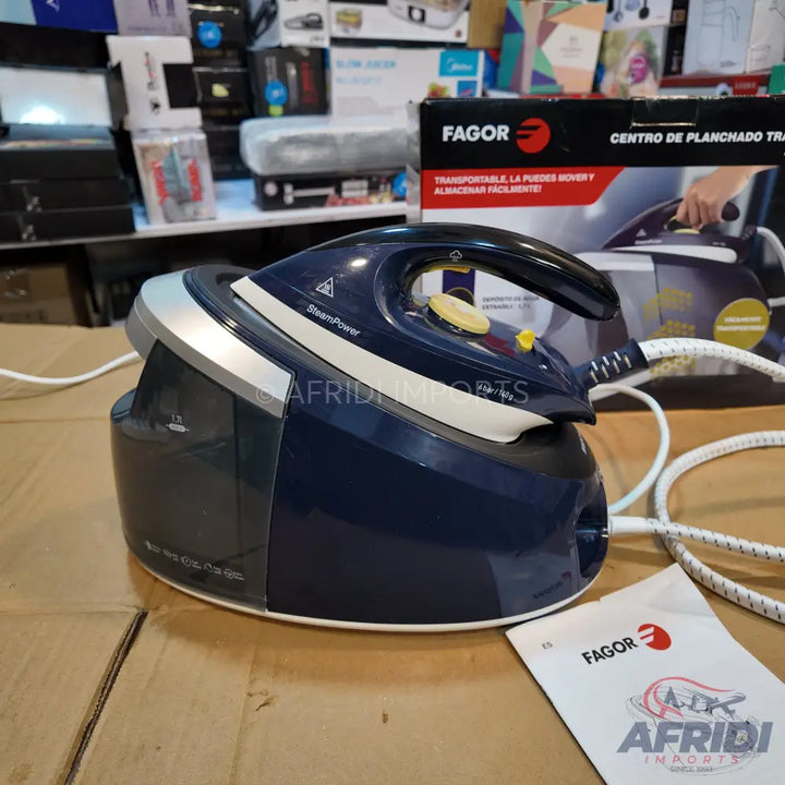 Blue and silver steam iron with a water tank and a yellow temperature dial.